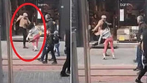 Sokak ortasında kadını tekmeledi. Çevredikler tepki gösterince kaçtı