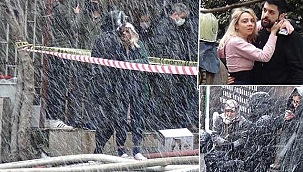 Binanın çatı katında yangın çıktı. Kar altında sokakta kaldılar