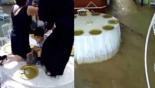 Düğünü sel bastı! Misafirler masaların üzerine çıkarak...