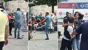  Kadını darbeden saldırgana kafa attı