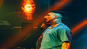 Konserde büyük panik! Hayranının saldırısına uğrayan Uzi...