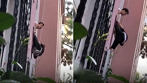  Pencereden kaçmaya çalışan hırsızı ensesinden yakaladı