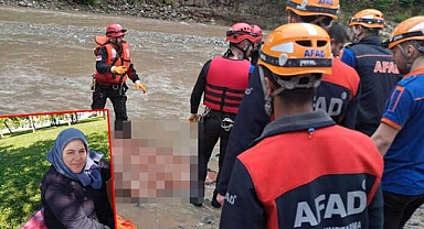 Dere kenarında cesedi bulunan kadın akıntıya kapılmış