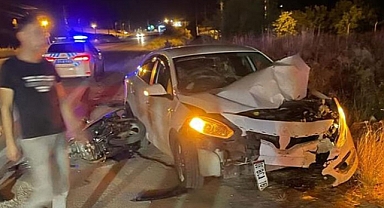 Otomobille çarpışan motosiklet sürücü