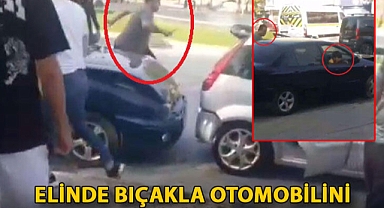 Otomobilini tekmeleyen sürücünün peşinden bıçakla koştu