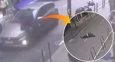 Yolda borçlusunu görünce canını hiçe sayarak otomobilinin üstüne atladı