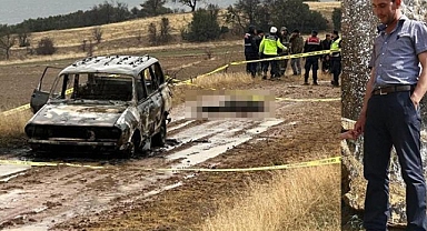 Yanmış otomobilin yanında bulunan cesedin, kayıp başı aranıyor