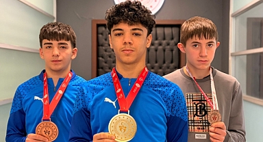 Şampiyon güreşçilerden İl Müdürü Kabakcı’ya ziyaret