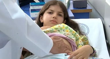 'Mucize' nakille hayata dönen 9 yaşındaki Nisanur, doğum gününü doktorları ile kutladı