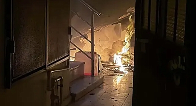 Yangında mahsur kalan kadının imdadına polis memuru koştu!